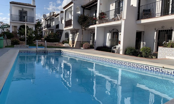 Nerja House | Andalusian people. Maria House