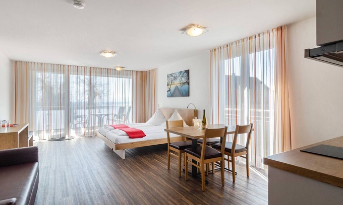 Immenstaad am Bodensee Apartment | Apartment 'Typ A2' with Shared Terrace, Shared Garden and Wi-Fi