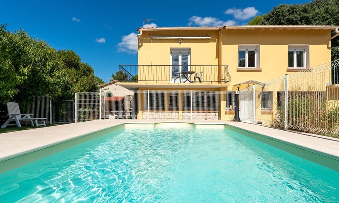 Quartier des Espesses Apartment | Apartment 'Bas Maison Nîmes' with Shared Pool, Wi-Fi and Air Conditioning
