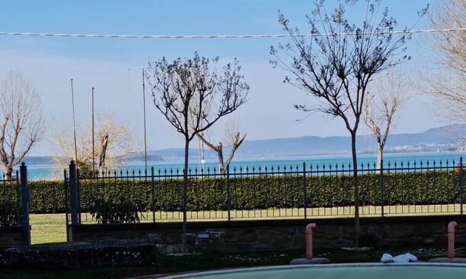 Torricella Apartment | Apartment 'Casa Torricella Sul Lago Trasimeno' with Lake View, Wi-Fi and Air Conditioning