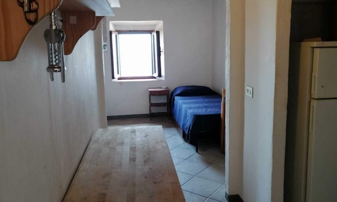 Isola del Giglio Apartment | Apartment in the village Intimate castle with sunset sea view