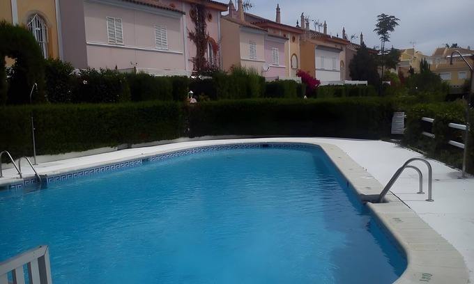 Isla Cristina Apartment | Apartment 'Mirador Del Golf' with Shared Pool, Private Terrace and Wi-Fi