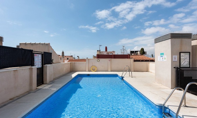 Centro Apartment | Apartment 'Suite Jinetes' with Shared Pool, Wi-Fi and Air Conditioning