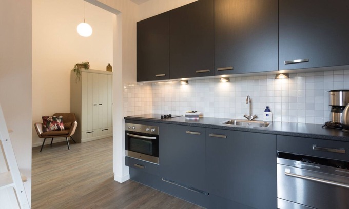 Oostkapelle Apartment | Apartment with balcony on the sunny side, close to nature and beach.