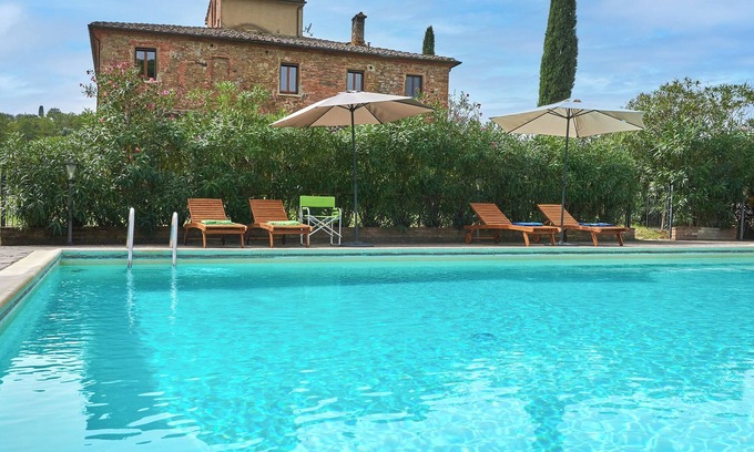 Torrita di Siena Apartment | Apartment with a beautiful view of the pool and Torrita village