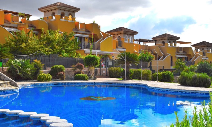 Los Puertos Condo | Apartment with large garden and air conditioning