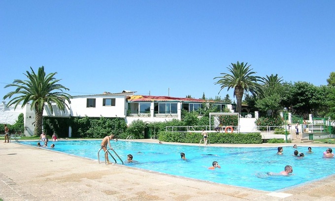 Miami Platja House | APCOSTAS - Camping Playa y Fiesta: Bungalow en bois avec accès direct à la plage à Mont-roig del Camp