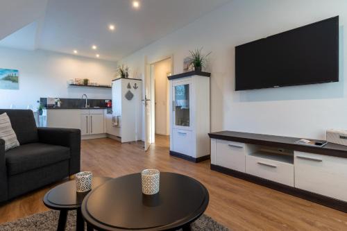 Tumlauer Koog Apartment | Appartement unter Reet Blinkfüer