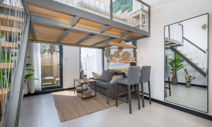 Jumeirah Village Apartment | Aria G08 JVC · Tropical Loft with working station in JVC
