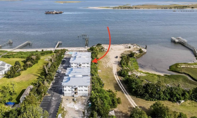 Southport Condo | Ask about low weekly rates - Amazing Water & Sunset Views- Just Blocks From Southport! Gorgeous Pool