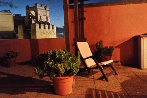 Oristano Apartment | Attico in centro con vista della torre - Cozy penthouse facing to the tower