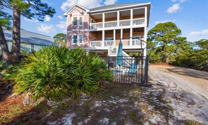Sea Palm Village House | ATTITUDE ADJUSTER IS THE PERFECT FAMILY GETAWAY! Tucked away on over an acre of land.