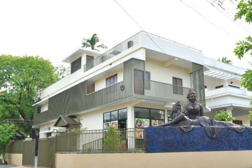 Thalassery Hotel | Ayush Green - Home Away Home