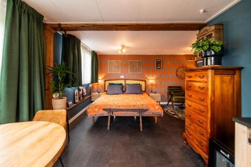 Noordgouwe Bed & Breakfast | B&B de Gouwe Tijd, suite "Gouden Ginkgo"