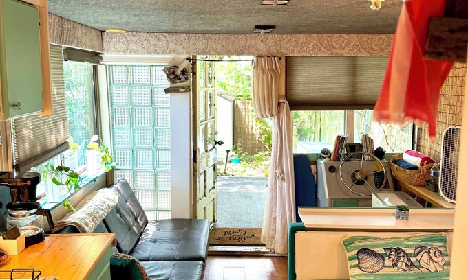 North Charleston Boat Rental | Backyard Boathouse walking distance- a/c and outdoor garden space, pet perfect