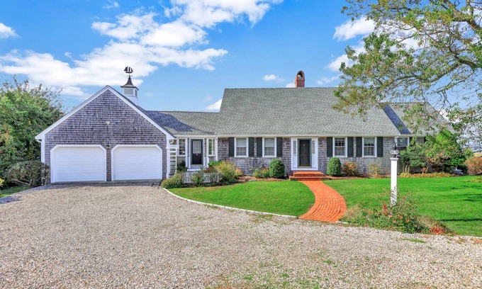 Dennis House | Bay Side with a shared private beach.