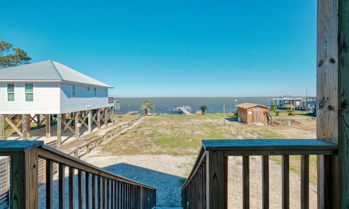 Fort Morgan Cottage | Bayfront Vacation! Enjoy amazing sunsets, wildlife viewing, and fishing.