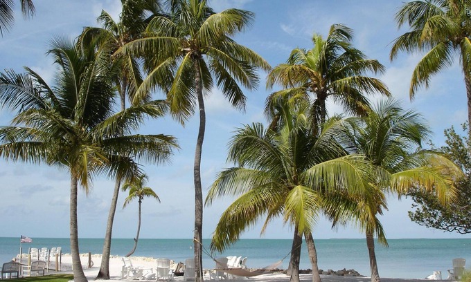 Bonefish Bay House | Bayside Paradise: Beach, Heated Pool, Spa, Boat Ramp, Dockage, and Tennis Court