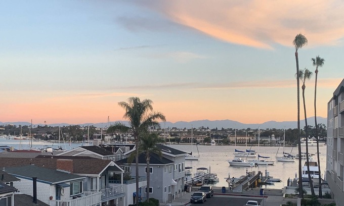 Balboa Peninsula House | Beach and Bay Retreat near Fun Zone with spectacular views from rooftop deck