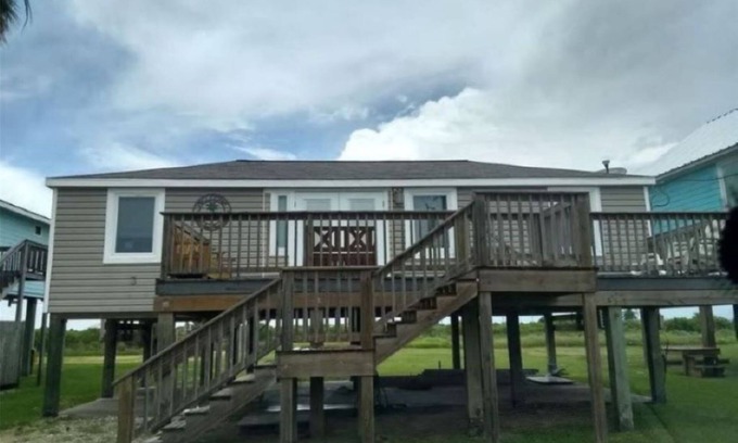 Matagorda House | Beach and river view cottage with deck and specatuclar views.