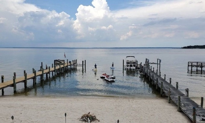 Mount Holly House | Beach & River Retreat. Spectacular house with private sand beach and hot tub!