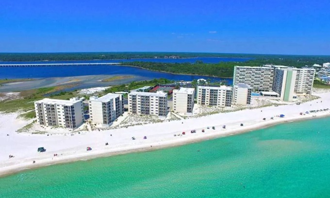 Sunnyside Condo | BEACHFRONT PENTHOUSE CONDO Gorgeous GULF FRONT and lake views! Newly updated!