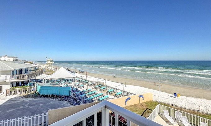 New Smyrna Beach Condo | Beachfront, Pool, BBQ & Game room! Extra Windows = More Light & More Views