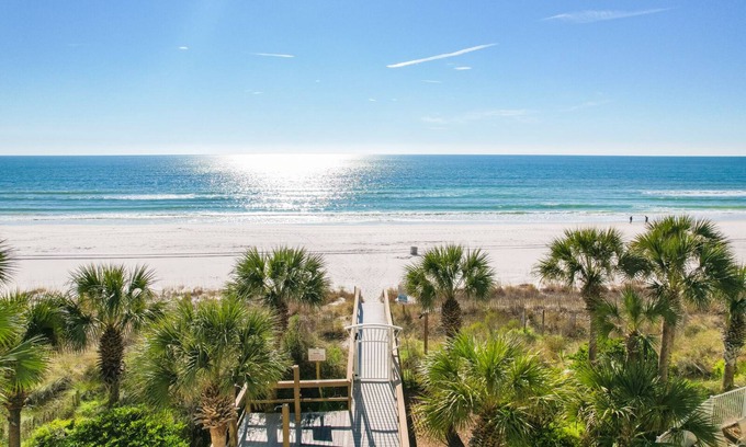 Thomas Drive Condo | Beautiful beachfront unit with complimentary beach service for two!