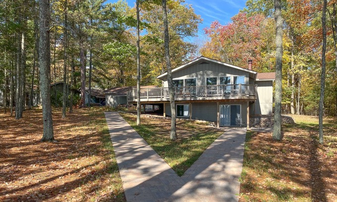 Eagle River House | Beautiful cabin with private dock, canoe, & shared tennis/basketball - dogs OK