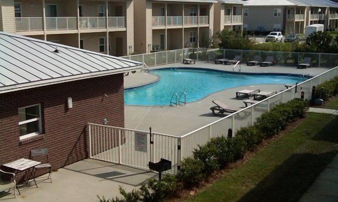 Gulf Shores Condo | Beautiful Furnished in Courtyard Overlooking Pool 2nd floor