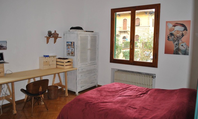 Oltrarno Apartment | Beautiful room surrounded by greenery and very bright, with garden.