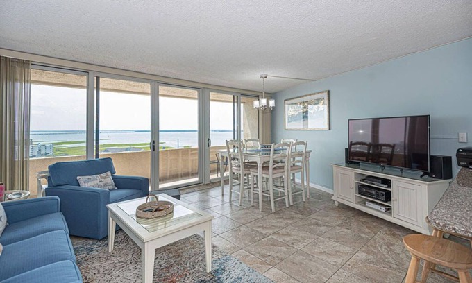 Midtown Ocean City Condo | Beautiful sunset and ocean view from 2 Bedroom Condo with Free WiFi and an Outdoor Pool Located in Midtown Only Steps to Beach!