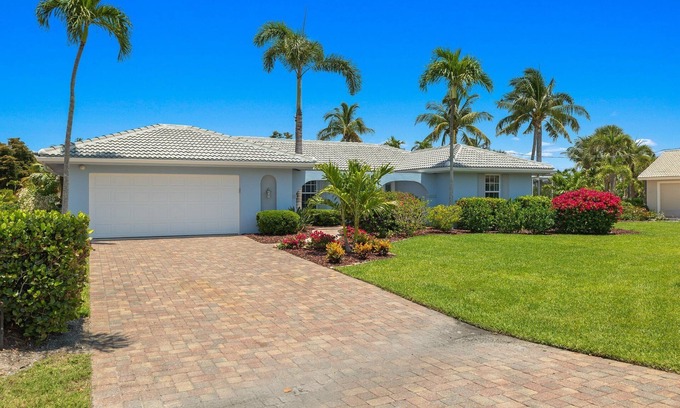 Shell Harbor House | Beautifully newly redesigned canal front pool home minutes to beach! NEW!