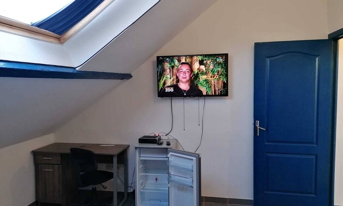 Nimy House | Bedroom 2 With TV, Wifi and Fridge