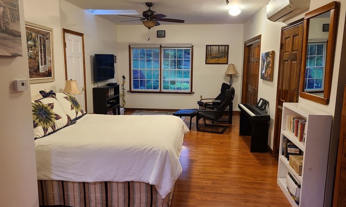 Redding Ridge Apartment | Bedroom, bathroom with beautiful shower, second room with work or eating area.