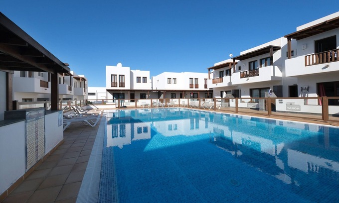 Puerto Calero Ski Chalet | Bella Vista - Shared Pool and BBQ By Lanzarote Vacation Homes