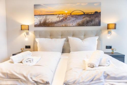 Marienleuchte Apartment | BeltBlick 16 - Moderne Ferienwohnung direkt an der Ostsee mit Meerblick und Sauna!