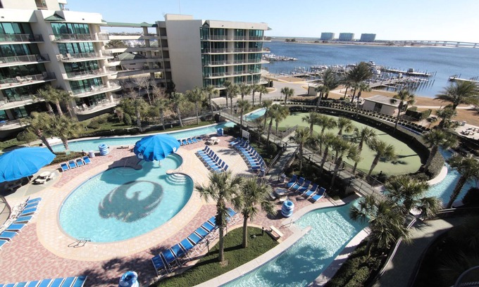 Orange Beach Condo | BEST 5th FLOOR VIEW @ PHOENIX ON BAY 2BR/2BA, Lazy River, Water Slide, Boat Slip
