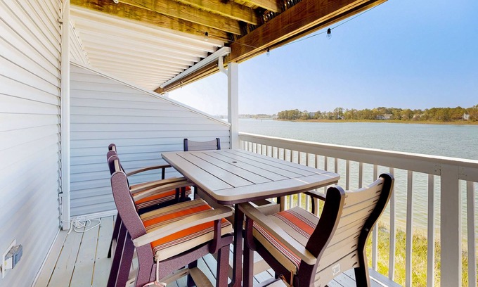 Ocean View Condo | Bethany Marina bayfront condo with pool, fireplace, water views
