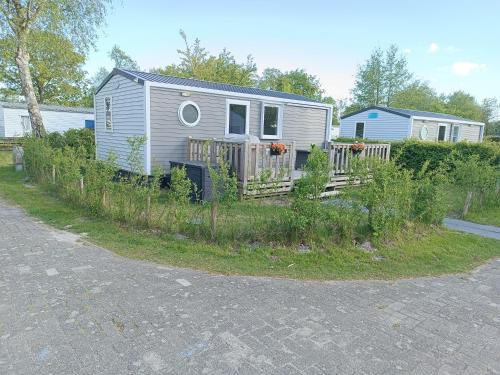 Lauwersoog Ski Chalet | BJ Chalets - Robbengat 85 - Gezellige chalet op vakantiepark Lauwersoog! Vroege incheck! MET AIRCO!