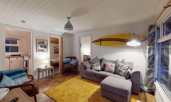 Hayle Ski Chalet | Bojago soaks up the evening sun, which can be enjoyed from an elevated rear garden. Sea Views.