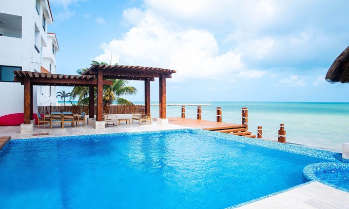 Chicxulub Puerto Condo | Brand New Beachfront Deluxe 3 BR Condo