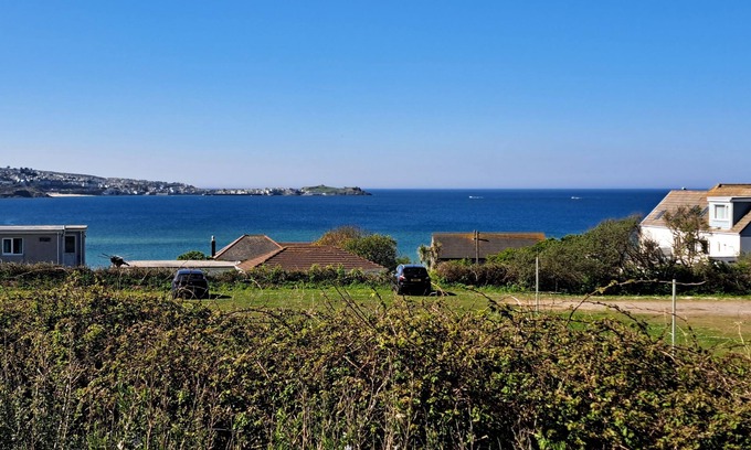Hayle Ski Chalet | Branksome enjoys lovely sea views from its enclosed deck and also has front and rear gardens.