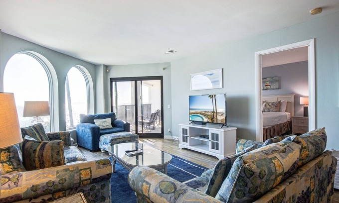 Isle of Palms Villa | Bright and spacious condo with beach & ocean views, pool, basketball & balcony