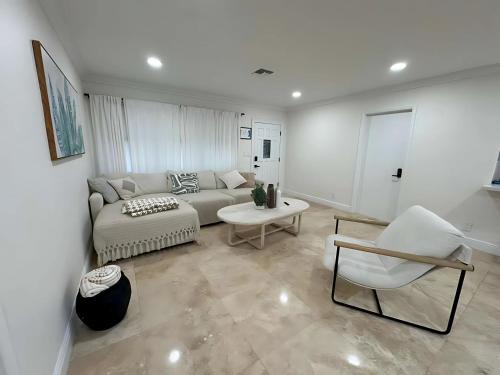 South Corals Villa | Bright Fort Lauderdale Villa with Private Heated Pool, Modern Décor and Palm-Lined Outdoor Oasis