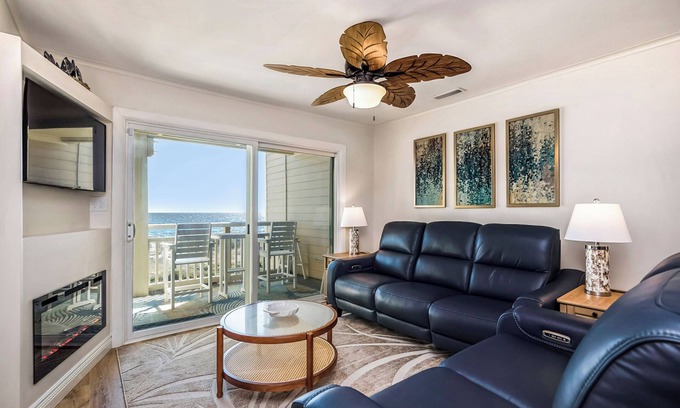Caswell Beach Condo | By The Ocean Blue: Oceanfront Luxury on Caswell Beach with Community Pool