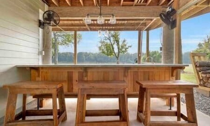 Butte La Rose House | Cajun rustic industrial studio style
