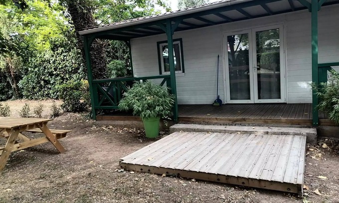 Anduze Ski Chalet | Campsite Flower Les Fauvettes * - Chalet EPICEA comfort 48m2, (3 bedrooms-6 people) with covered terrace, air conditioning and wifi for short stay 6 people