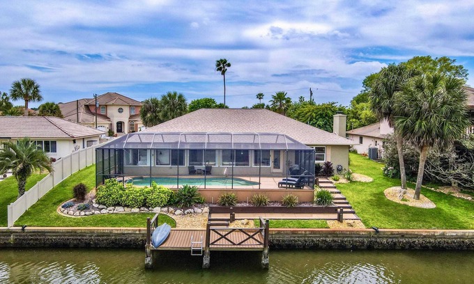 Palm Harbor House | Canalfront with Pool Kayaks Bikes & Boat Access
