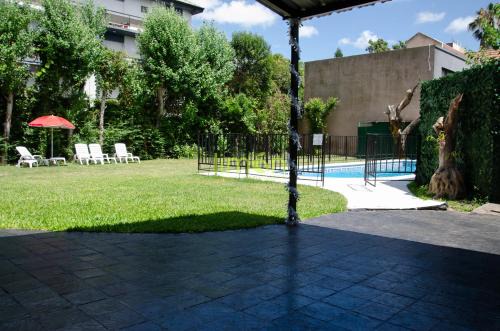 Tigre House | Casa Amplia 5 personas con Jardin y Parrilla
